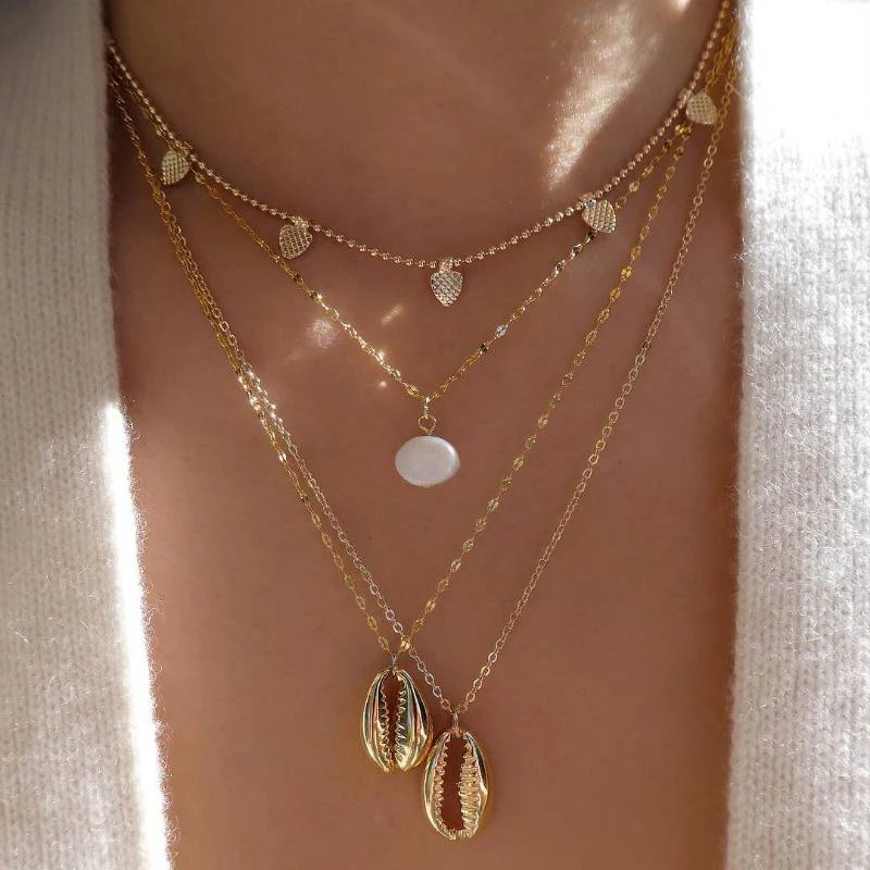 

Boho Personality Beach Pearl Shell Leaf Heart Gold Chain Pendant Multilayer Necklace Fashion Long Necklace Set Jewelry
