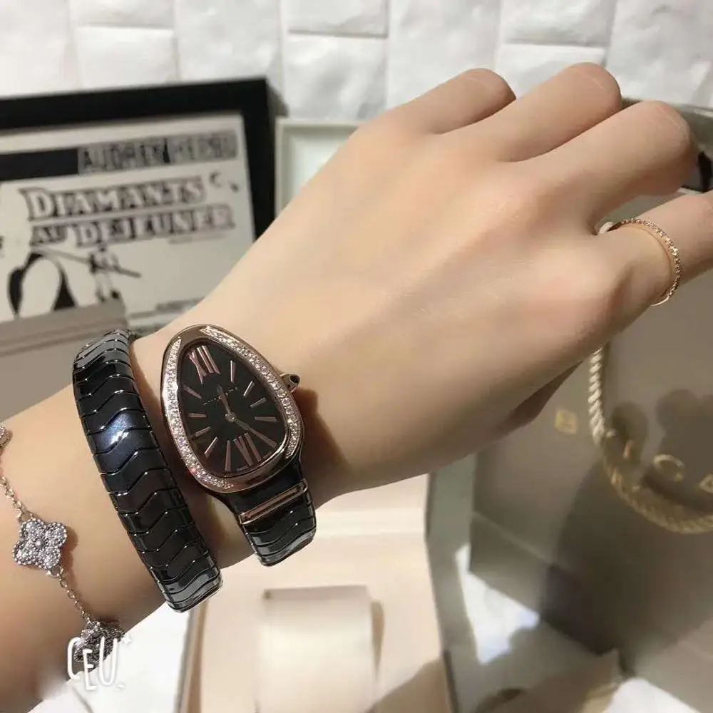 

Women Luxury Top Brand Ladies Quartz Watch Snake Shape Ceramic Watchband Diamond Bezel European Design Waterproof Wristwatches