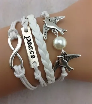 

1pc cord Birds,peace, and Infinity Charm Bracelet in Silver- White Wax Cords and Leather Braid - Friendship Gift 995