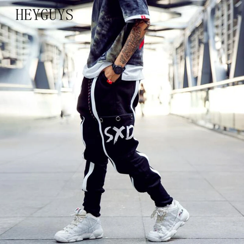 

Europeand the United States street fashion hip hop pants men's trend loose sports beam pants students knit pants casual trousers