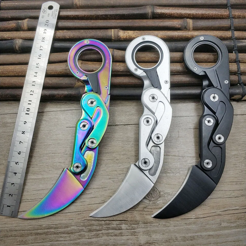 

Dropship fade karambit CSGO folding pocket knife Stainless steel Portable counter strike mechanical tactical claw knife EDC tool