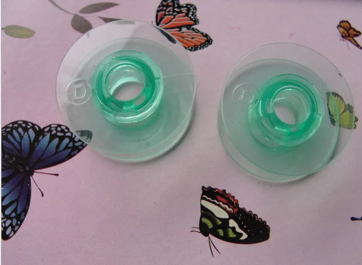 

50 Green Sewing Machine Viking Husqvarna Plastic Spool Bobbins, Part Number: 4131825-45 or 4125615-45