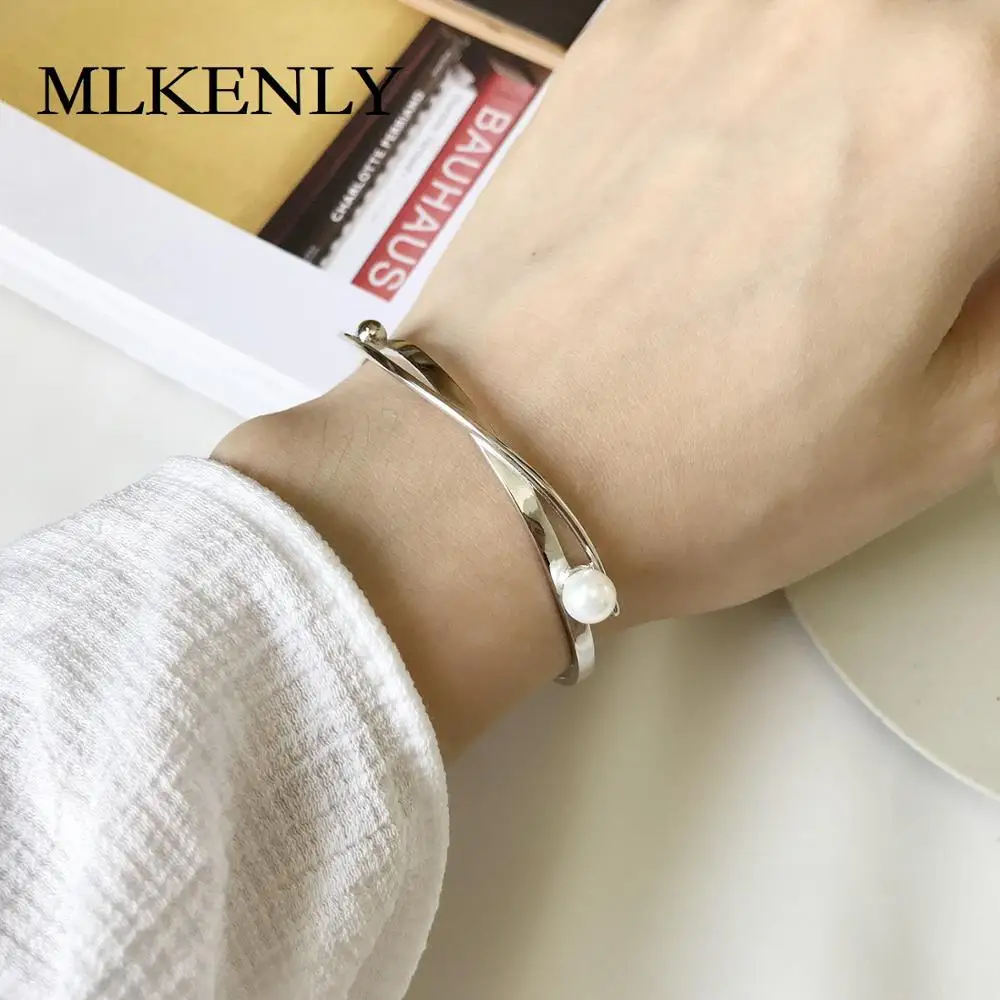 

MLKENLY 925 Sterling Silver Jewelry Silver Platinum plated in Simple distortion Mobius bracelet for Women Popular beauty