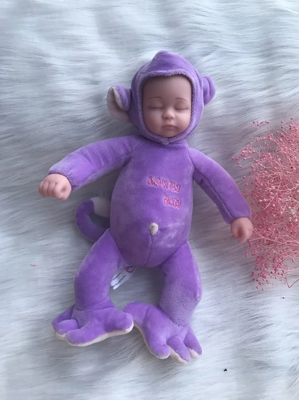 25/35 см спящий младенец куклы Reborn с милыми животными, плюшевая кукла игрушечный олень, детский приятель кровать игрушки, силиконовые перерожденные куклы младенцы, с музыкой - Цвет: Purple Monkey