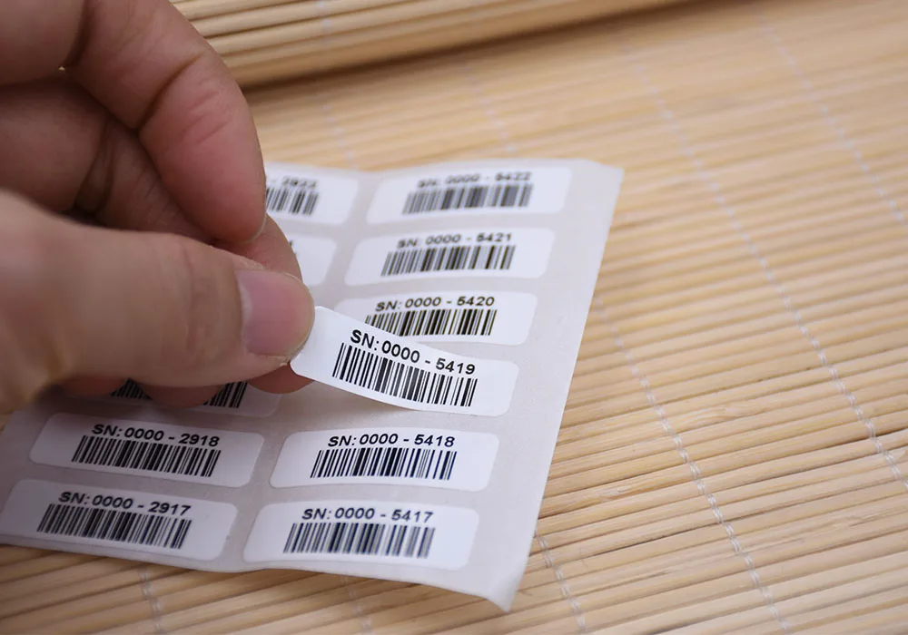 

Barcode stickers in roll black printing glossy finished Logistic label
