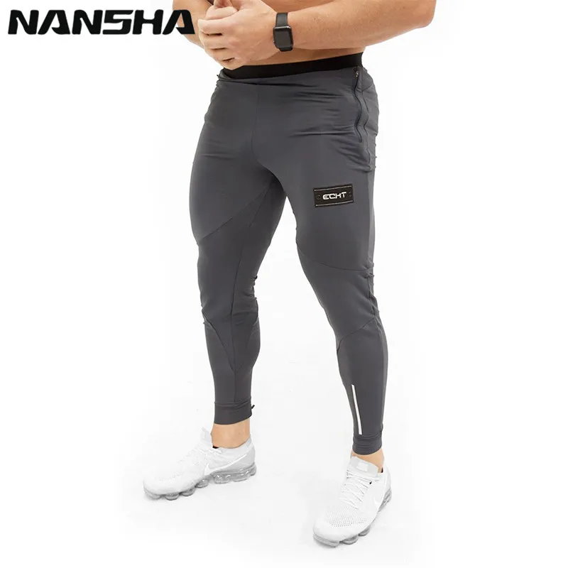 

NANSHA New Gyms Mens Joggers Pants Fitness Casual Trousers Fashion Bodybuilding Gyms Brand Joggers Sweatpants Men Pants Cotton