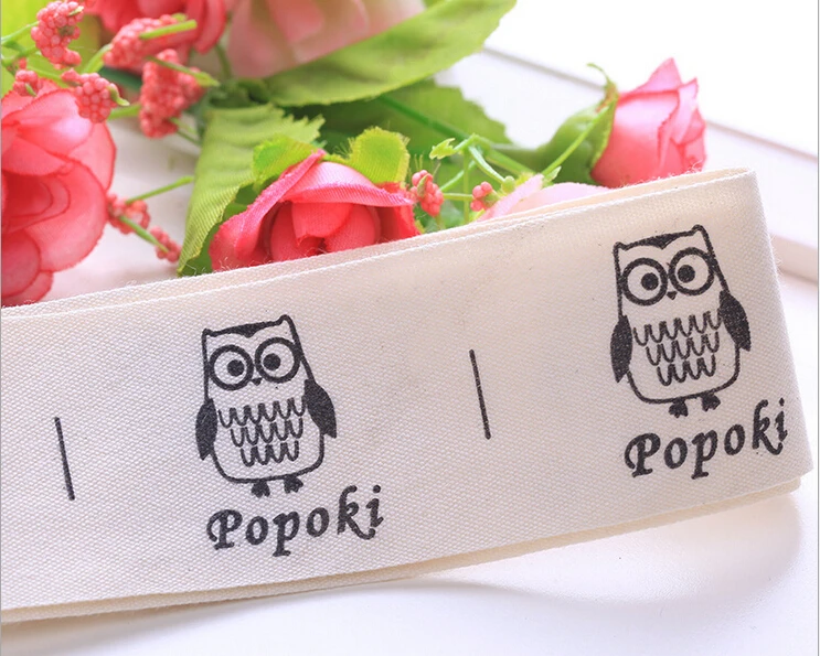 

Free shipping 1000pcs/roll pure cotton labels, custom logo printed clothing labels, child clothing use tags, free design for you