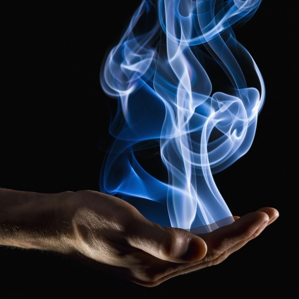Smoke Wisps From A Hand Poster Print (14 x 14)