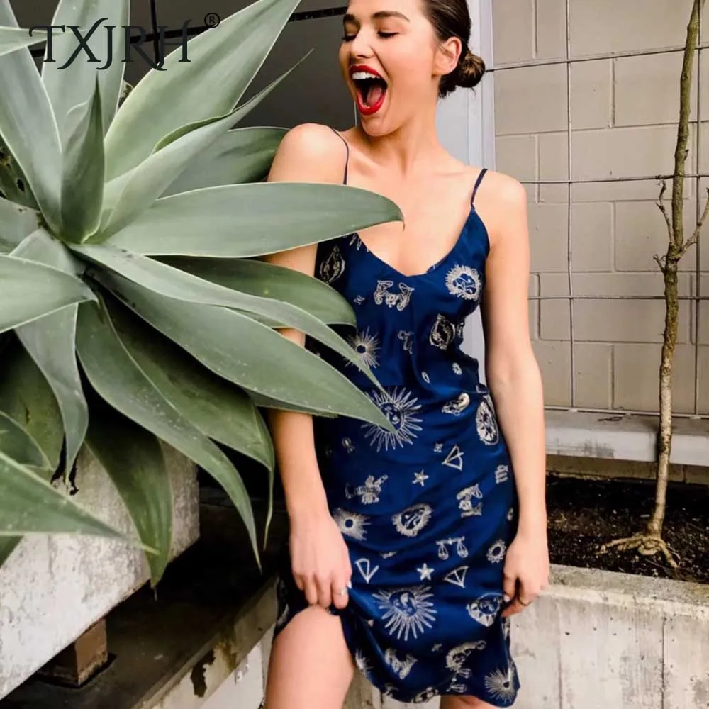 Skup TXJRH Sexy słońce konstelacji druku głębokie dekolt w serek imitacja satyny pakiet Hip paski spaghetti Backless plaża Mini sukienka Vestidos