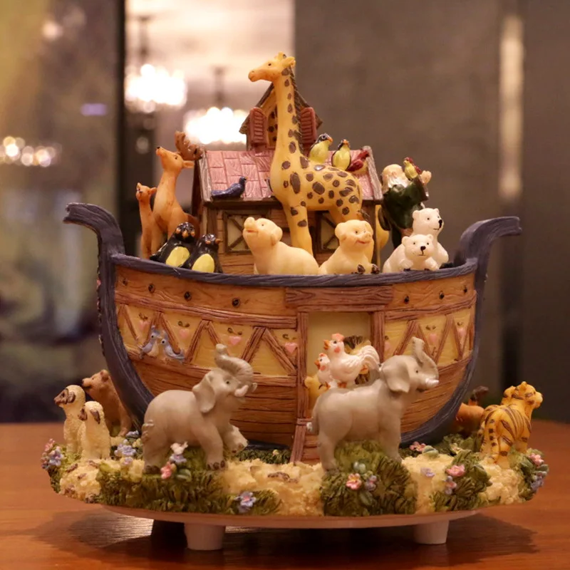 

automatic swivel Noah's Ark animal world resin music box