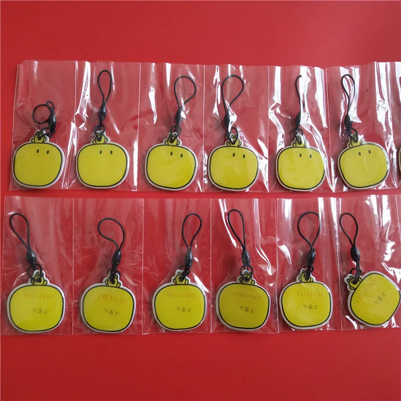 

Proximity EM4100 EM4102 125KHz RFID ID Card Tag Token Key Chain Keyfob Read Only Color Yellow Pack of 100