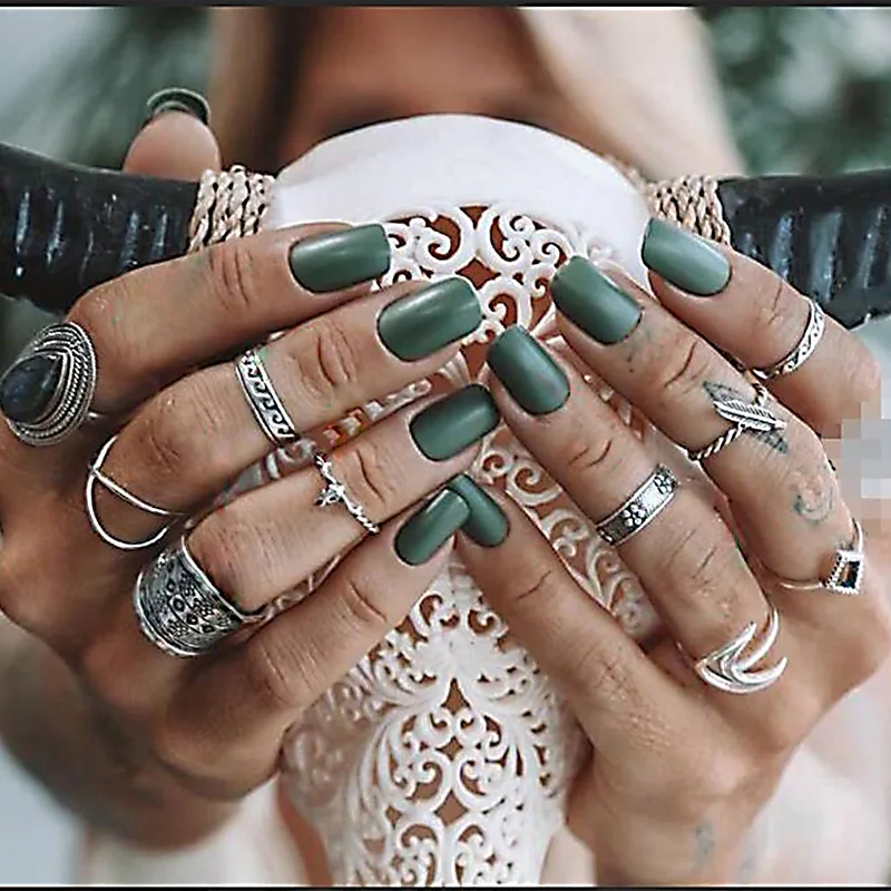 

pack of 10 creative knuckle rings with carved leaf and black resin teardrop gem design in silver