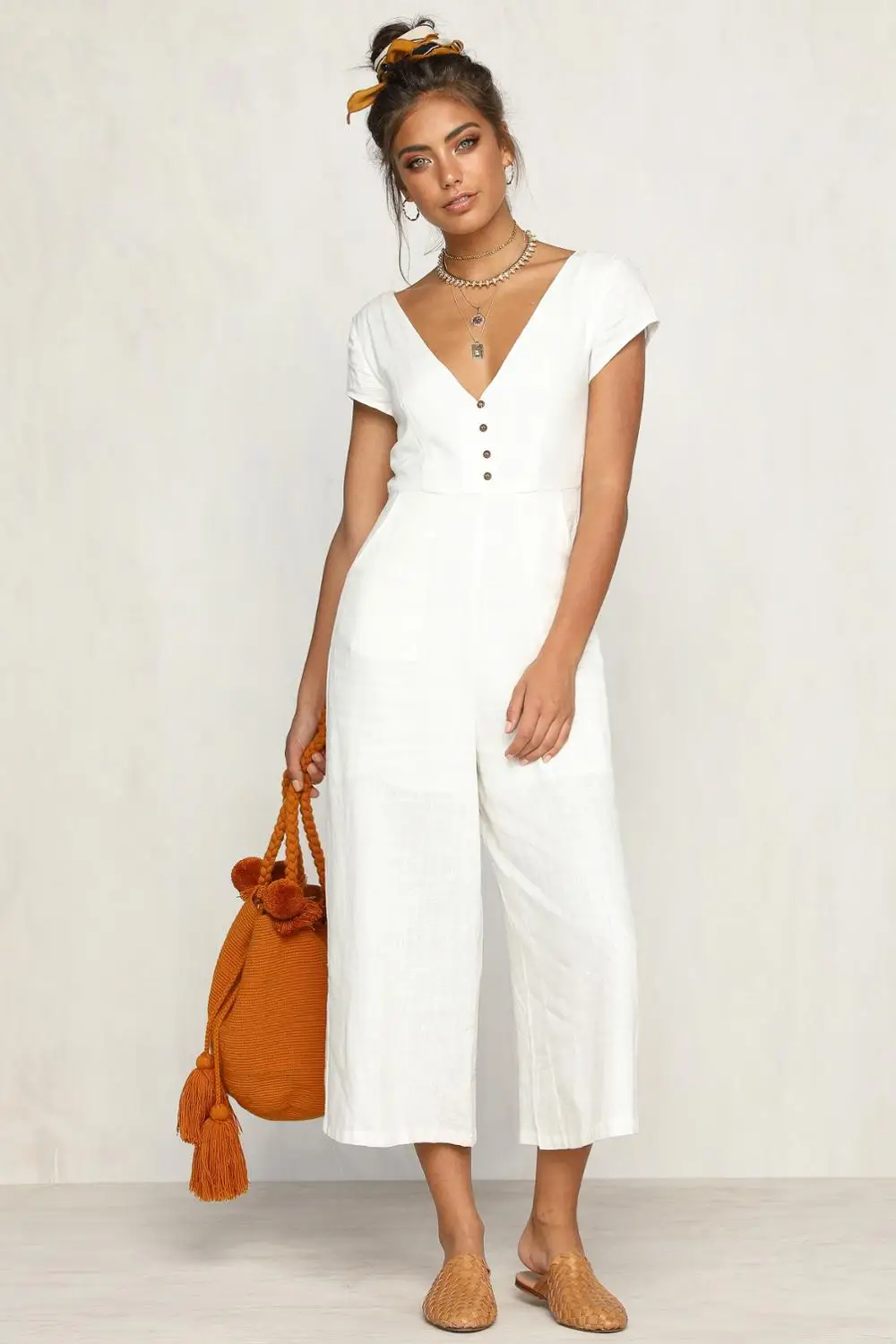 

Women jumpsuits summer short sleeve wide leg rompers Sexy Deep V loose long playsuit casual office lady plus size solid overalls