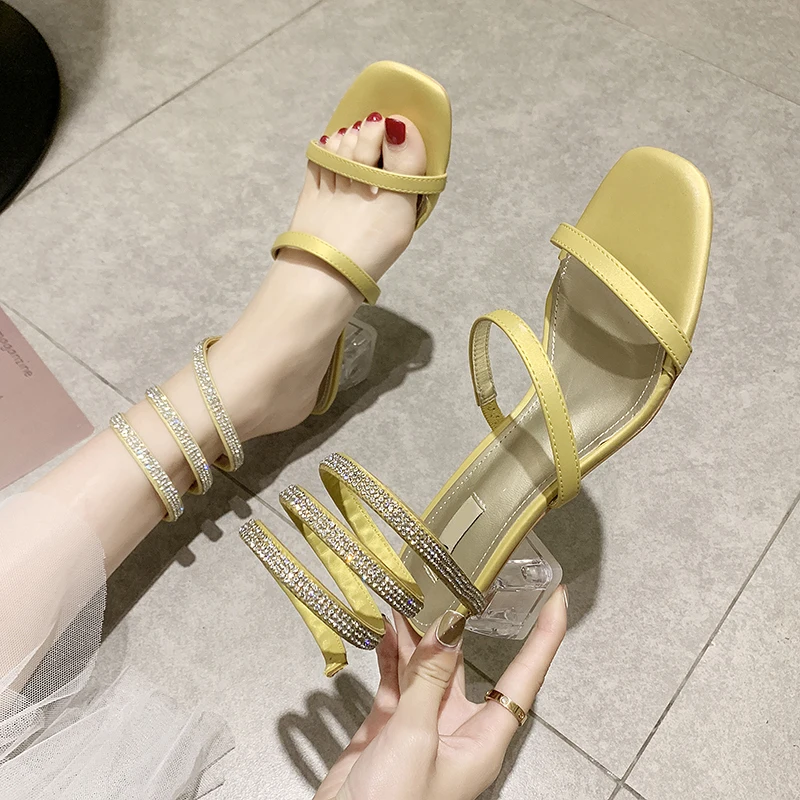 

Women's shoes sandals outdoor wear 2019 summer new snake-shaped winding crystal with flash drill open toe Roman shoes