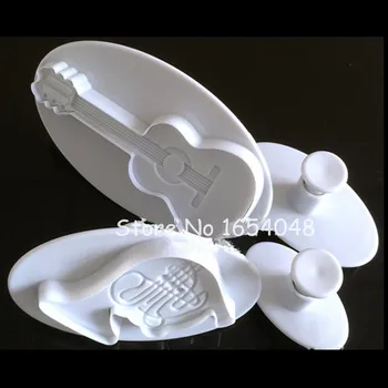 

Newest 4PCS/Lot Musical Instruments Cake Cutter Sets Violin Trumpet Guitar Note Shaped Plastic Cake Cookie Decorative Molds