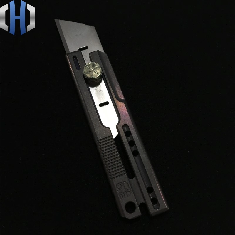 Three Generations Of Titanium Alloy Section Of Utility Knife Heavy Cutting Paper EDC Single Hand Opening And Closing Of The Box Three Generations Of Titanium Alloy Section Of Utility Knife Heavy Cutting Paper EDC Single Hand Opening And Closing Of The Box