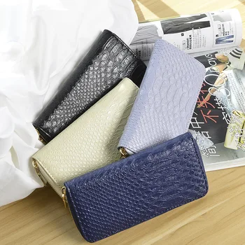 

2020 women's latest solid color crocodile pattern long hand embossed multi-card position Chiba compartment fashion simple wallet