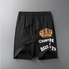 Повседневные мужские пляжные шорты черного и белого цвета, брендовые шорты с принтом короны, мужские свободные эластичные модные пляжные шорты Бермуды 512