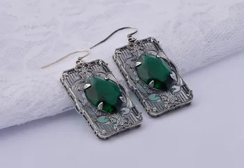 

In 2015 the European and American wind restoring ancient ways is 925 silver series women gem emerald pair of earrings