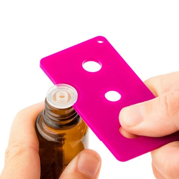 

Portable Essential Oil Bottle Swiss Key Roller Bottle Opener Remove Roller Caps Orifice Reducer Inserts On Essential Oils