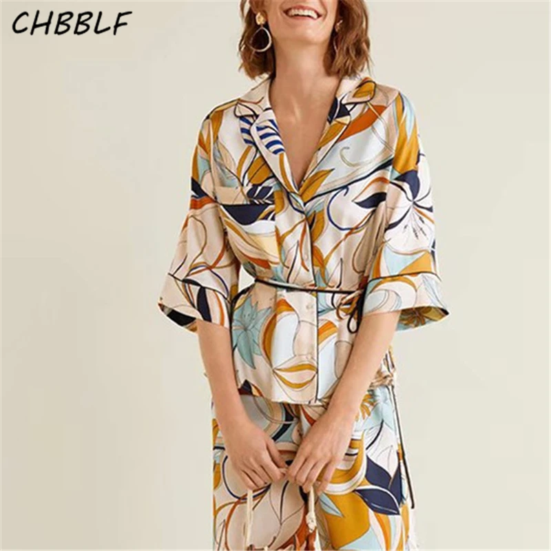 

CHBBLF women elegant floral blouse three quarter sleeve shirts ladies casual streetwear pocket tops blusas POP1473