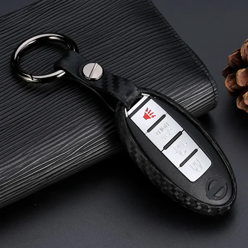 

WFMJ Carbon Fiber Silicone Key Chain Cover for Nissan Altima Pathfinder Murano GT-R Sentra Armada Rogue Quest Cube Maxima Versa