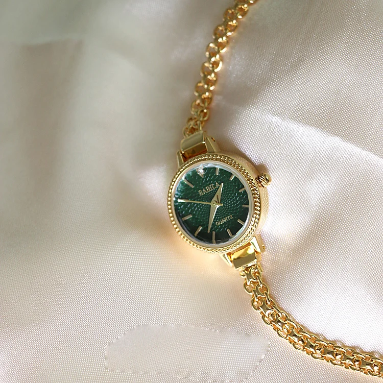 Женские часы модные круглые часы циферблат тонкий ремешок для часов Золотой Ретро кисточкой цепи кварцевые часы