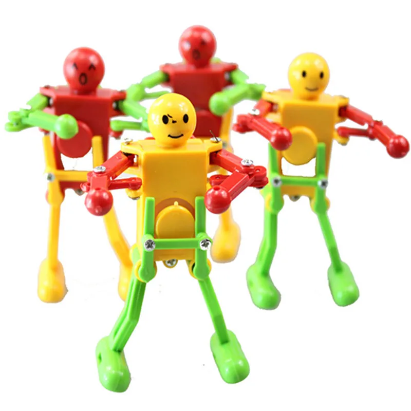 10pcs/lot Clockwork Spring Wind Up Dancing Robot For Children Kids Toy