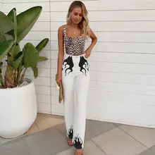 jeans with black flames on the bottom