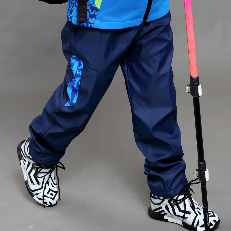 Baratos Pantalones de escalada para niños pantalones de chándal de primavera y otoño de invierno más pantalones deportivos de terciopelo a prueba de viento para niño grande