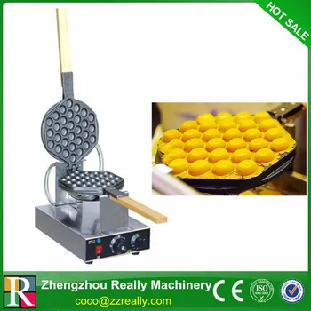 

Stainless Steel Electric Eggettes Egg Waffle Maker rotated 180 degrees