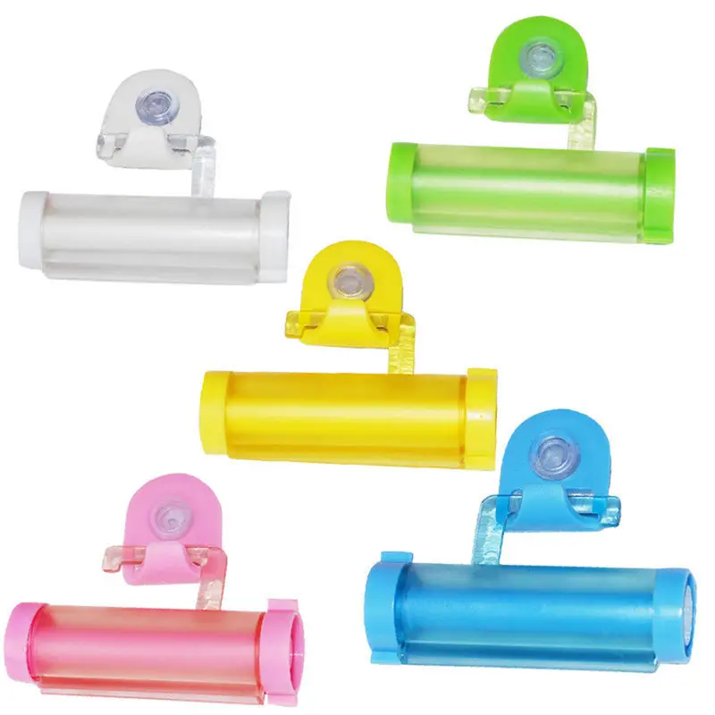 

1PC 5colors Rolling Squeezer Toothpaste Dispenser Tube Partner Sucker Hanging Holde Distributeur Dentifrice