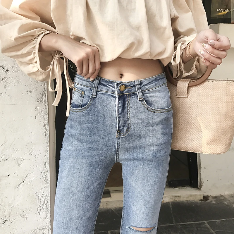 2019 modis spring summer Slim high waist sexy irregular ladies jeans Wide leg pants Korean nine bell bottom mom jeans women