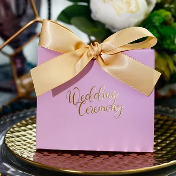 

RMTPT 20pcs/lot Purple High Quality Simple Paper Gift Bag bow-knot Candy Box With Handle Wedding favor Party Gift Package Bag