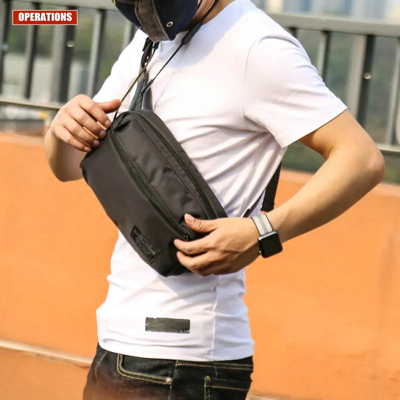 

2018 Men's new brand of fashion compact shoulder bag waterproof nylon Messenger bag casual chest bag men's Messenger bag unisex
