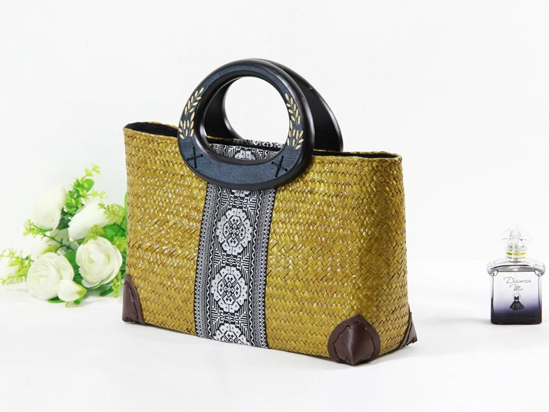 

Thai version of the new women's seaweed bag hand bag bag vines weaving fashion wooden handle beach bag