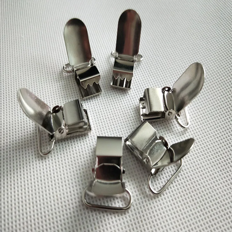 

Braces Clips Strap Hooks 20 mm Silver Coloured Metal Hook Pacifier Suspender Clips for Jacket Clothes Accessories 20 pcs/lot