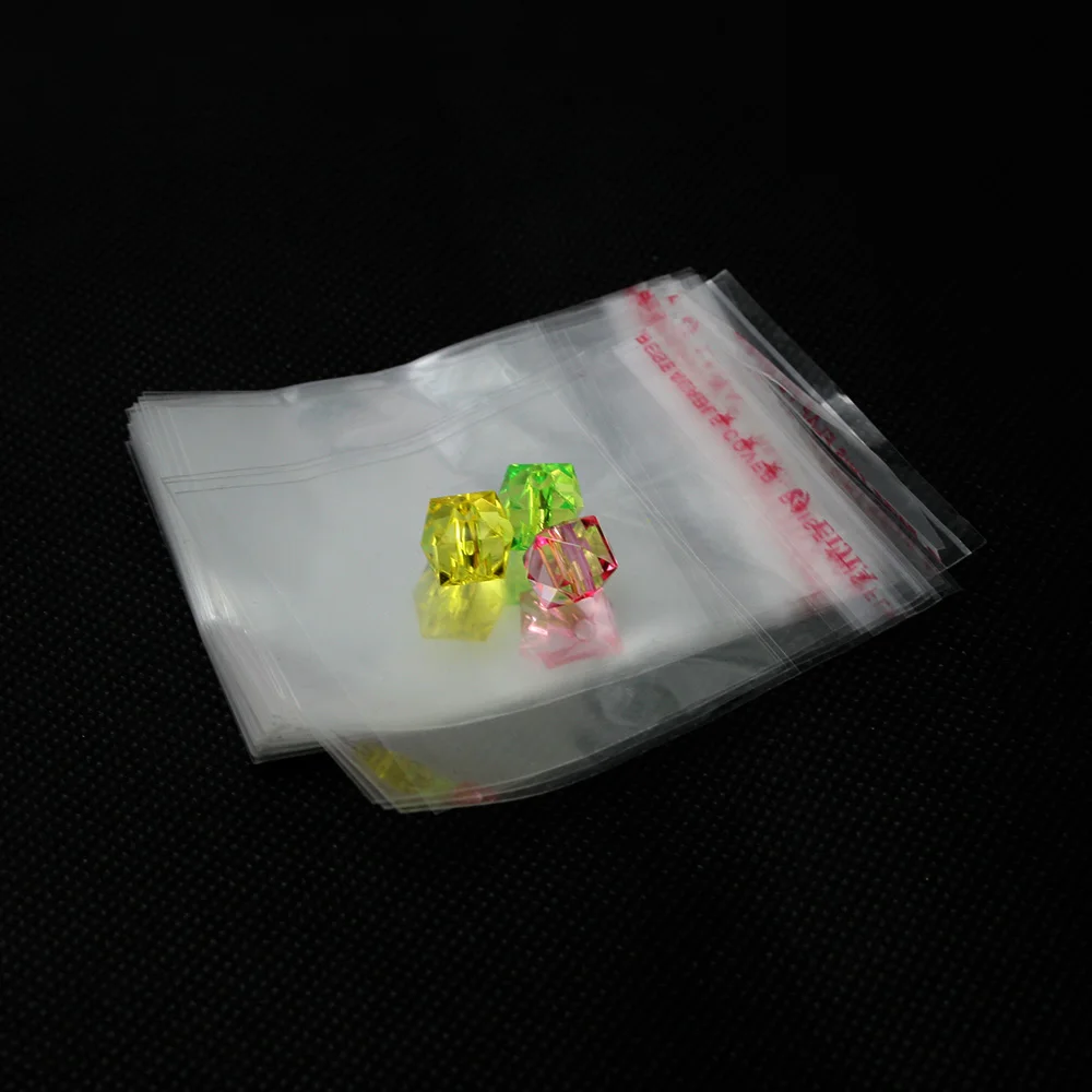 

Wholesale 200Pcs Transparent Clear Self Adhesive Seal Plastic Jewelry Bag ( Useable Space:5cm x 4cm ) 7cm x 5cm(2 3/8" x2")