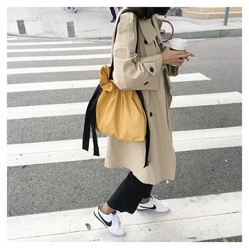 

Drawstring Ribbon Bucket Canvas Bag Female Shoulder Bag Korean Version of The Wild Handbag Bag Autumn and Winter Models
