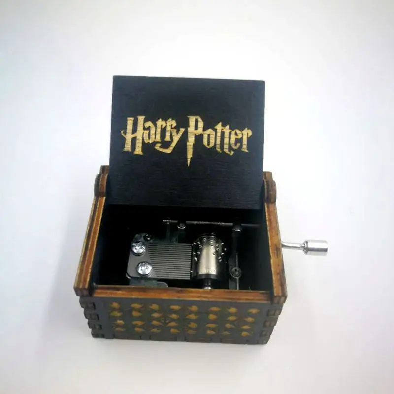

Free shipping The new 2019 black hand music box of harry potter lives in a small gift solid wood carving music box
