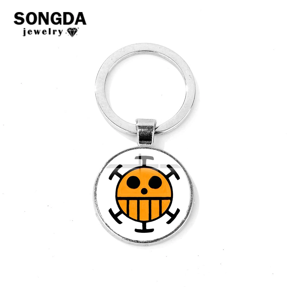 

SONGDA Anime One Piece Keychain Supernova Surgeons Trafalgar Law Symbol Glass Dome Metal Key Chain Cosplay Anime Exhibition Gift