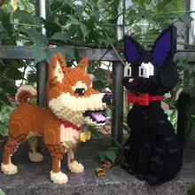 Pequenos blocos Bonito Modelo Shiba Inu Cão Educacional Tijolos de Construção de Plástico Crianças Brinquedos Dos Desenhos Animados Do Gato Leilão Figuras Presentes Das Meninas