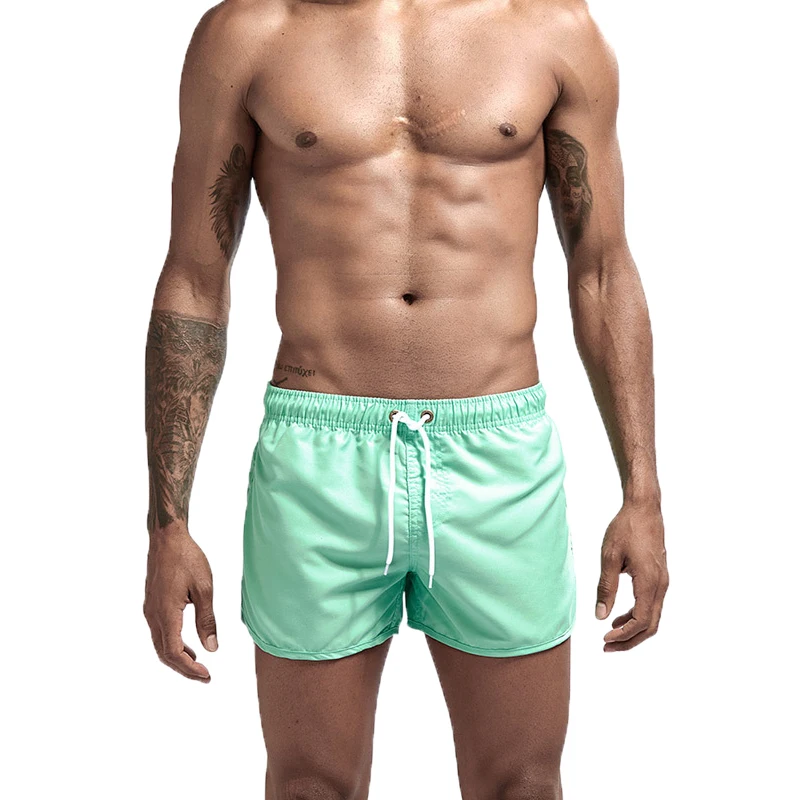 

Hot sell Men's sport running beach Short Swimsuits swim trunk pants Quick-drying movement surfing shorts GYM Swimwear for Men