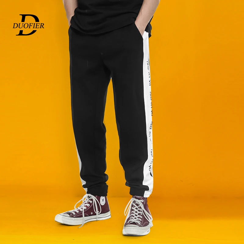 

2019 Autumn Men Jogging Trousers Hip Hop Streetwear Sweatpants Cotton Male New Loose Side Letter Pencil Pants Gyms Clothing
