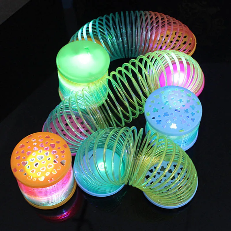 

Kids Children Glowing Rainbow Magic Circle Toys Colorful Stretch Spiral tension spring for Party Evening Light In Dark