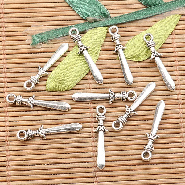 

100pcs tibetan silver color sword design charms EF2582