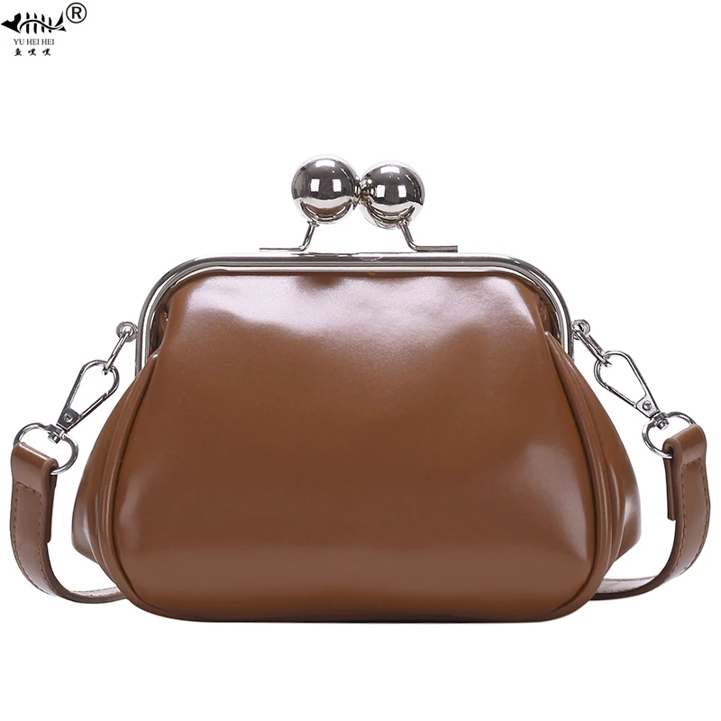 leather kiss lock handbag