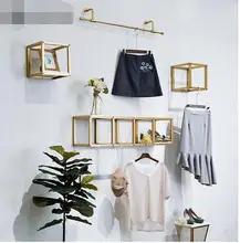 Cheap On the clothing store The Wall clothes rack display rack golden simple iron wall-mounted simple modern decoration bag display Cheap On the clothing store The Wall clothes rack display rack golden simple iron wall-mounted simple modern decoration bag display