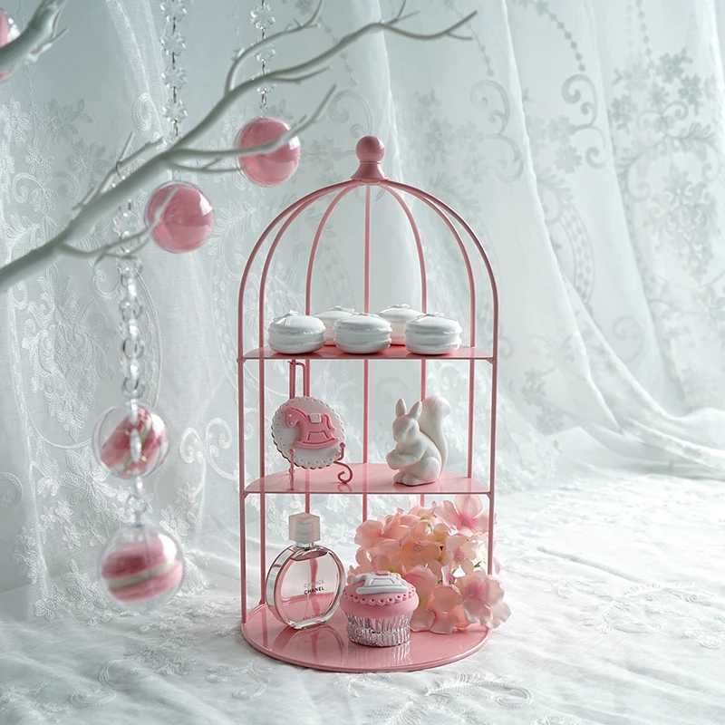 

Bird cage shape wrought iron cake stand Pink bird cage snack stand Wedding dessert table props Cake display stand