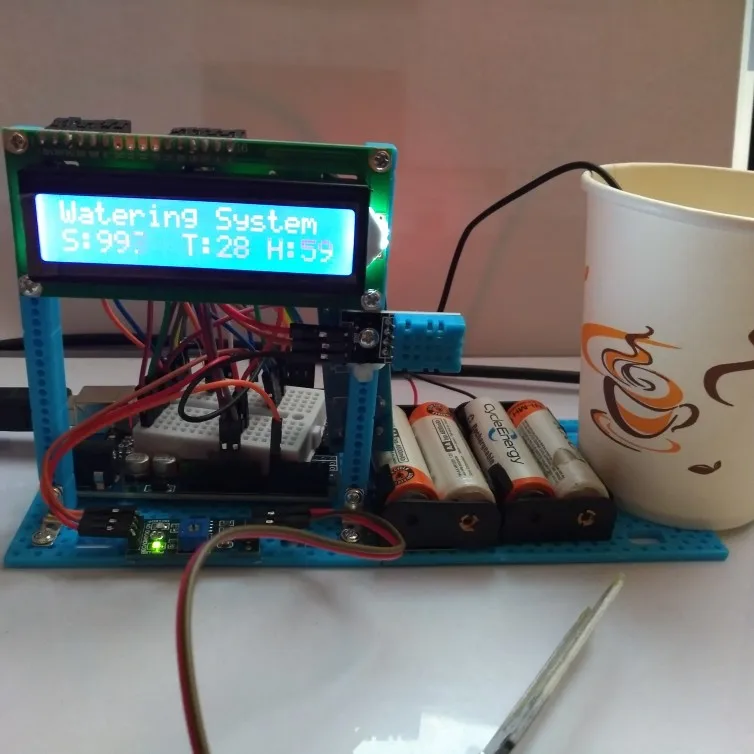 

Automatic Watering System of Soil Temperature and Humidity Control